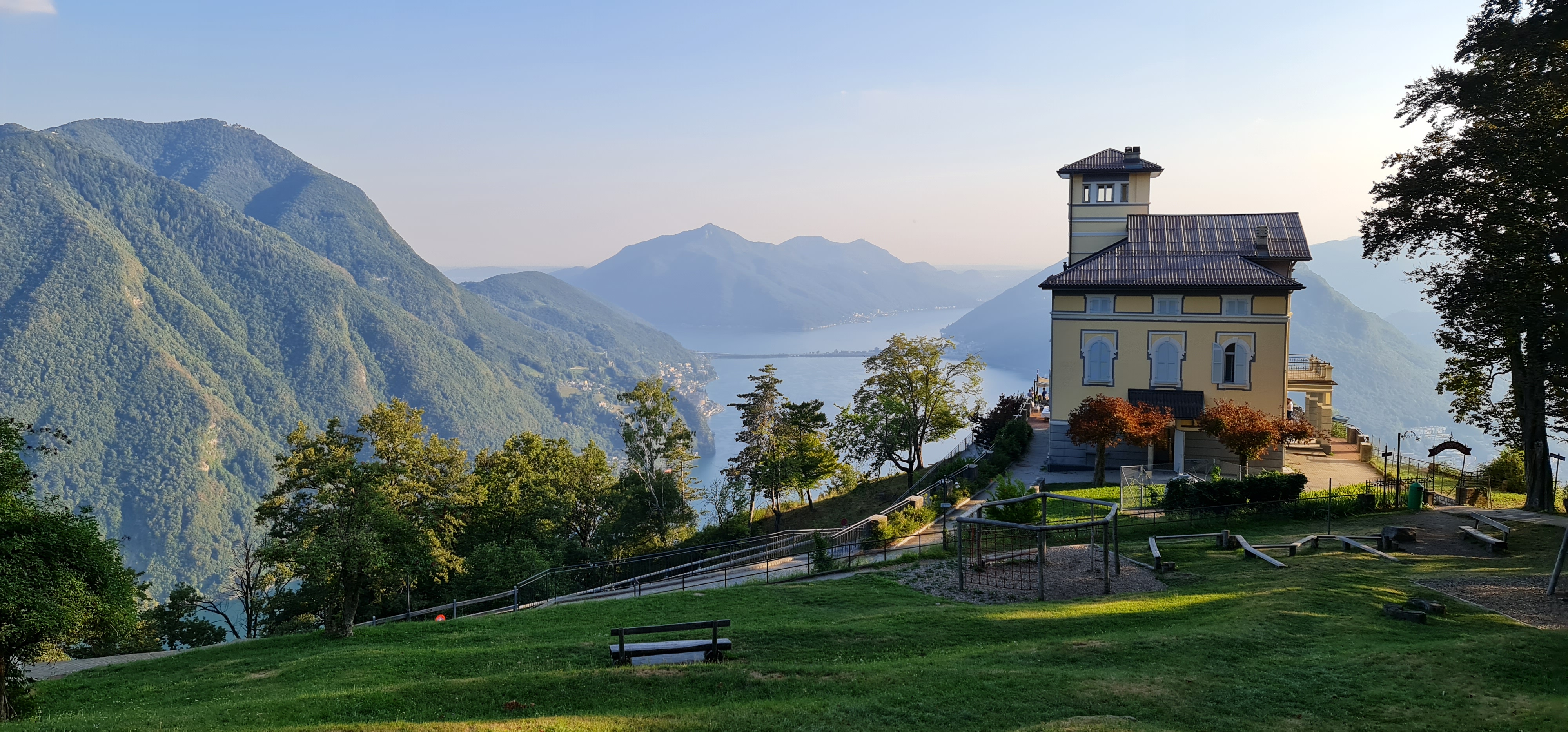 View from the top of Monte Bré, with lake Lugano in the background and the restaurant to the right.